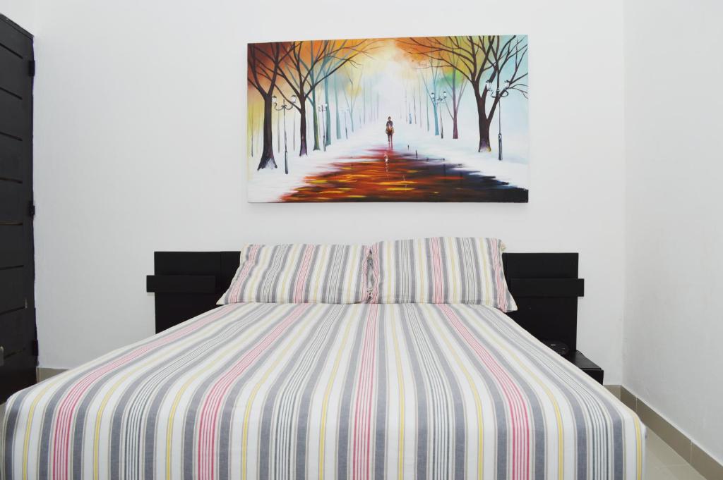 Postel nebo postele na pokoji v ubytování Hotel Merey