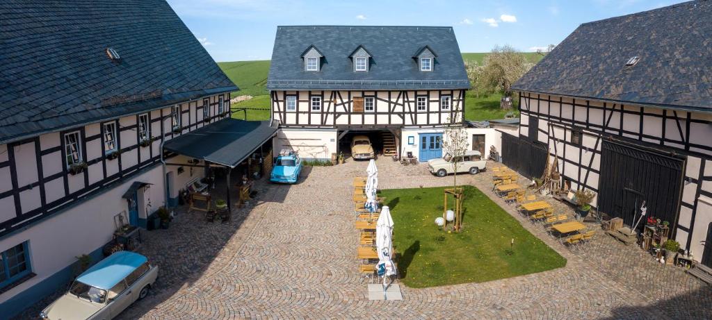 an aerial view of a building with a courtyard at Genusshof in Mülsen