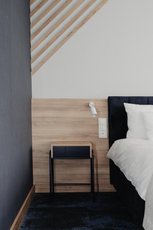 Posteľ alebo postele v izbe v ubytovaní Molto Bene Hotel & Restaurant