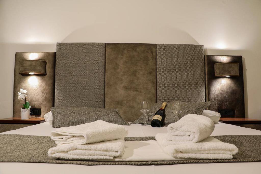 Postel nebo postele na pokoji v ubytování Hotel Dionysis Studios