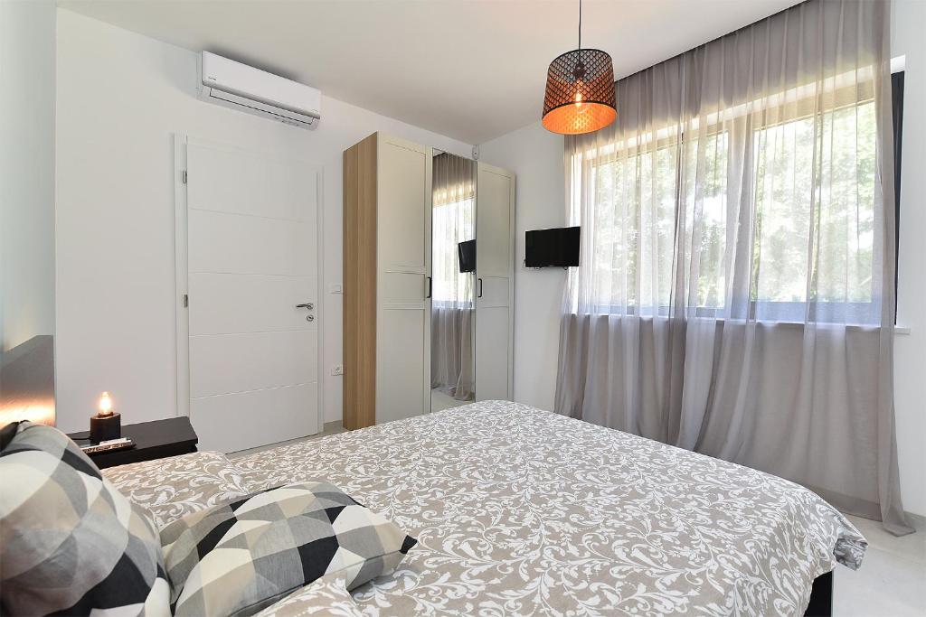 Postel nebo postele na pokoji v ubytování House Bijazici 2117
