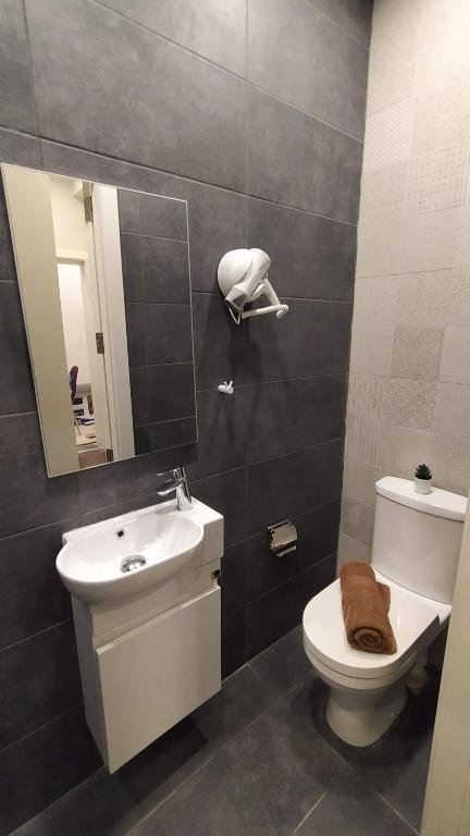 Koupelna v ubytování Cosy Albert's Seaside Suites (Sliema)