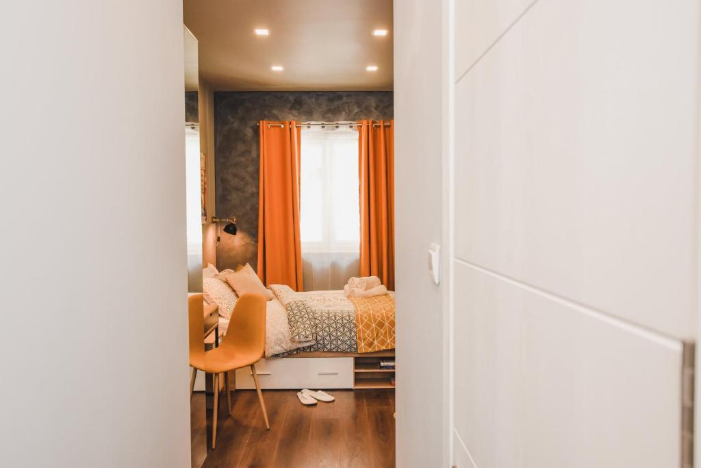 Postel nebo postele na pokoji v ubytování Cosy Albert's Seaside Suites (Sliema)