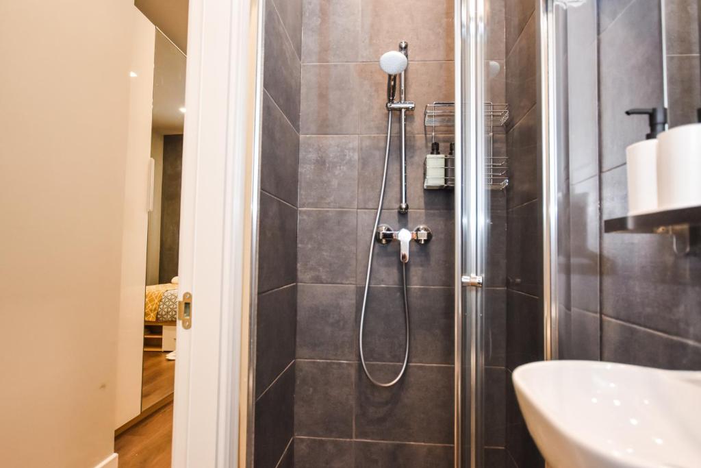 Koupelna v ubytování Cosy Albert's Seaside Suites (Sliema)