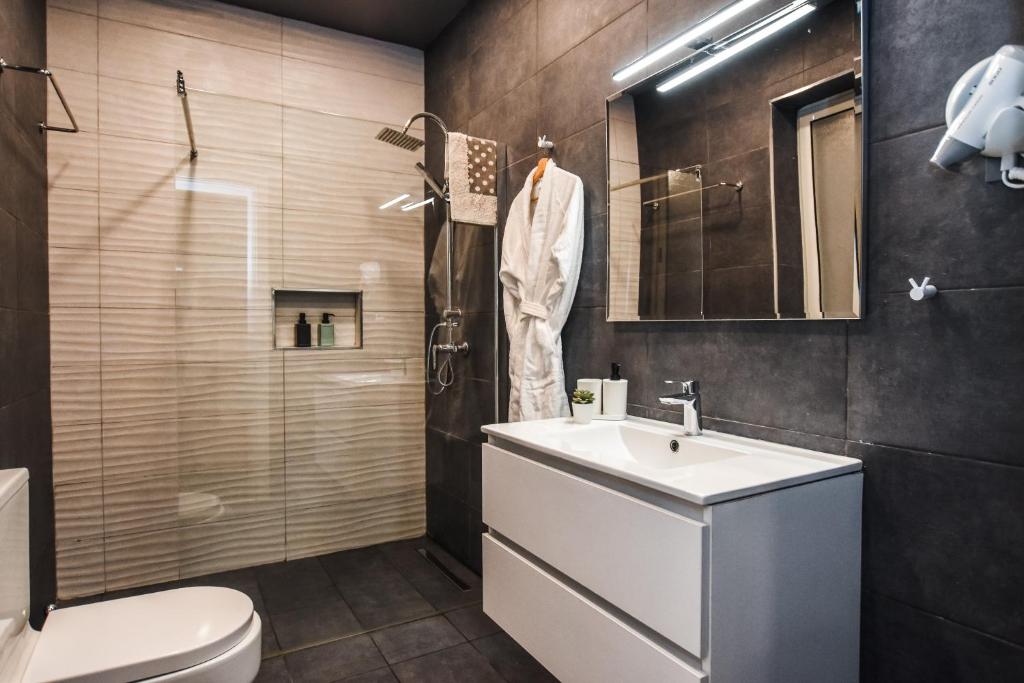 Koupelna v ubytování Cosy Albert's Seaside Suites (Sliema)