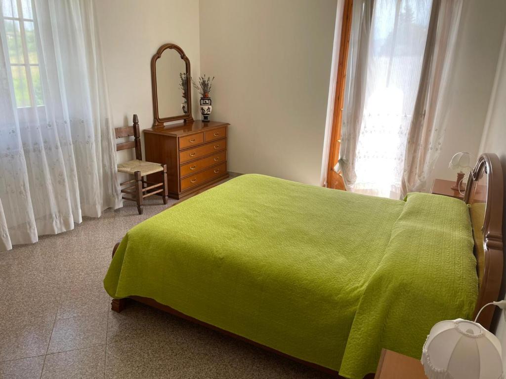 Postel nebo postele na pokoji v ubytování Il Nido Delle Rondini