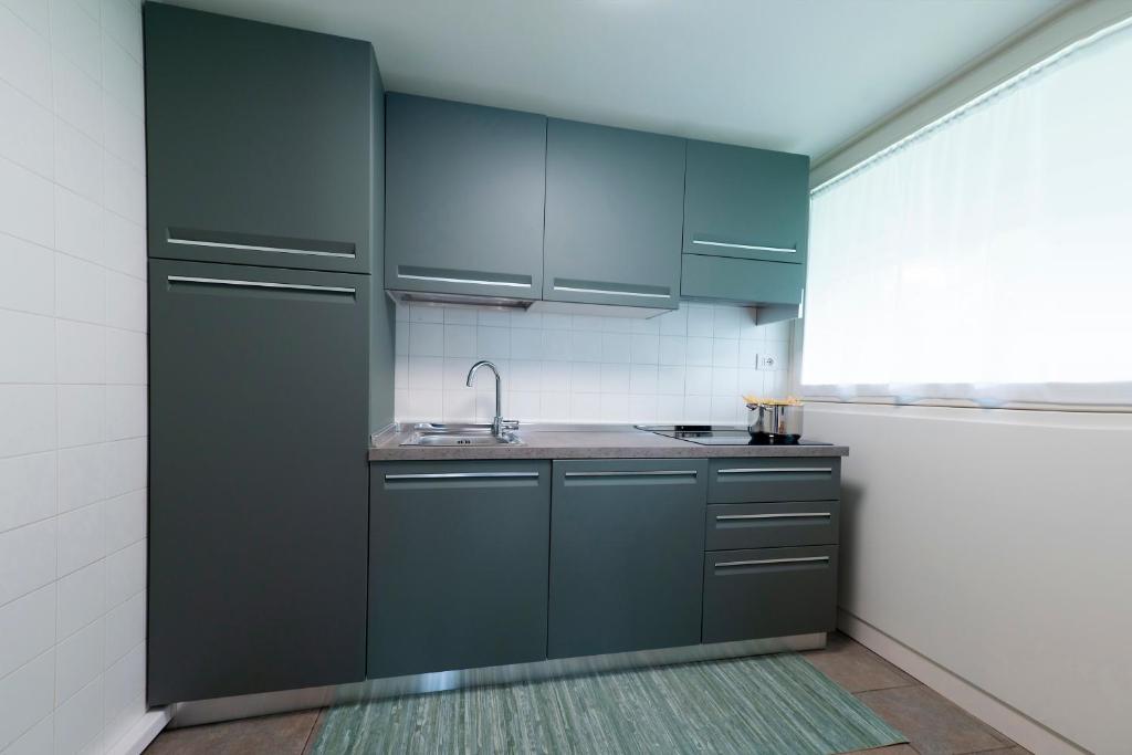 Een keuken of kitchenette bij Villa Onedo