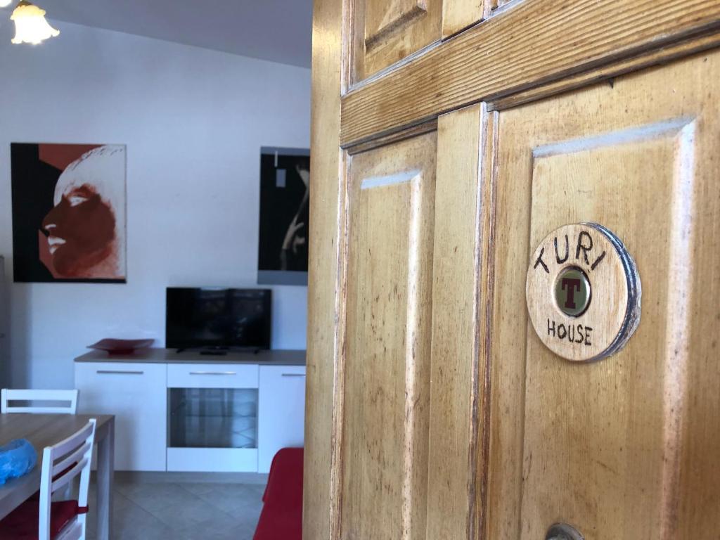 TV a/nebo společenská místnost v ubytování House Turi