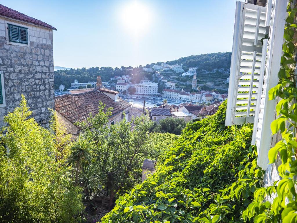 a view of a city from a hill at Central Art House Hvar in Hvar
