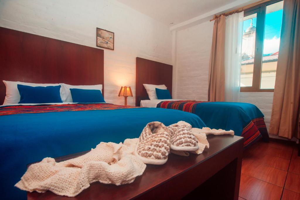 Postel nebo postele na pokoji v ubytování La Floresta Hotel