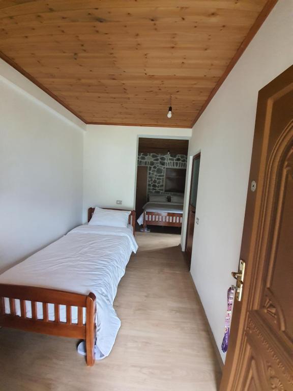 Letto o letti in una camera di Guest House Flodisa