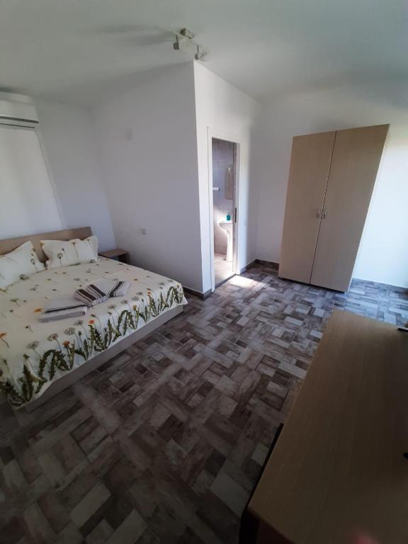 Postel nebo postele na pokoji v ubytování SunRise
