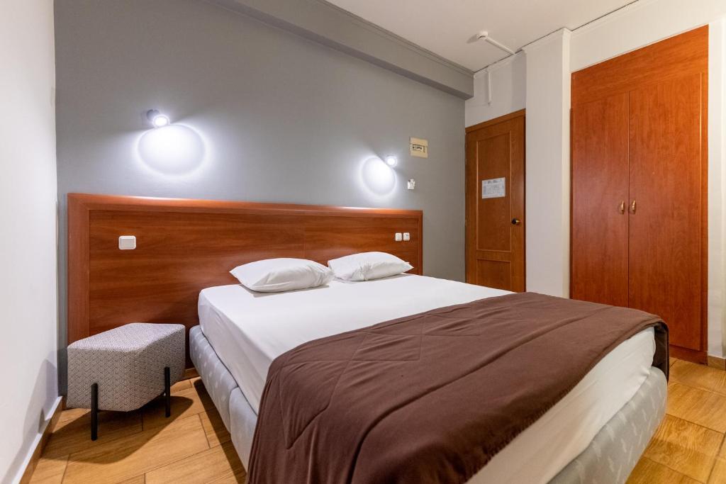 Letto o letti in una camera di Stalis Hotel