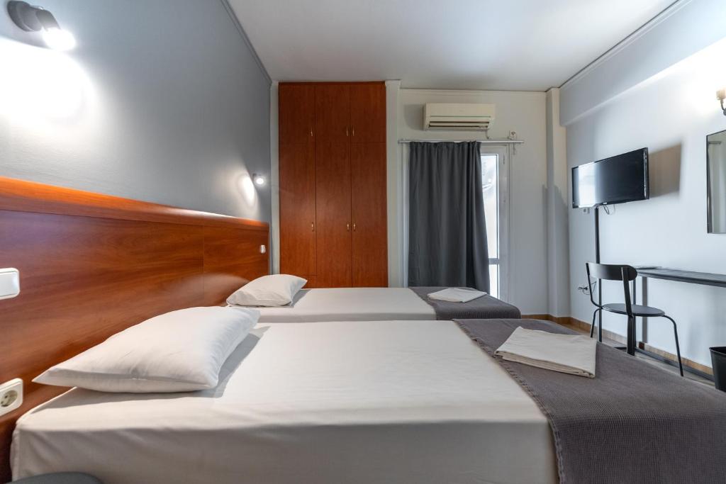 Letto o letti in una camera di Stalis Hotel