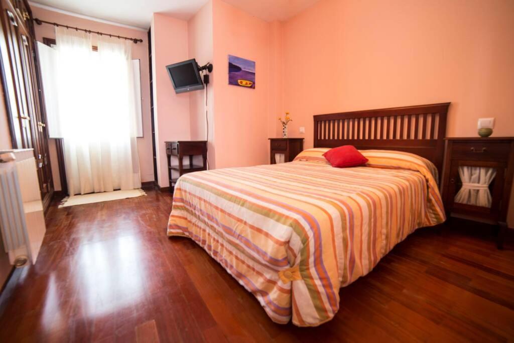 Postel nebo postele na pokoji v ubytování Casa Morazón Fontán Sada