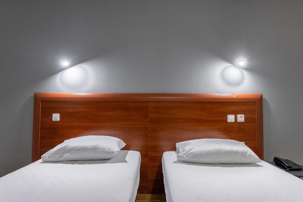 Letto o letti in una camera di Stalis Hotel