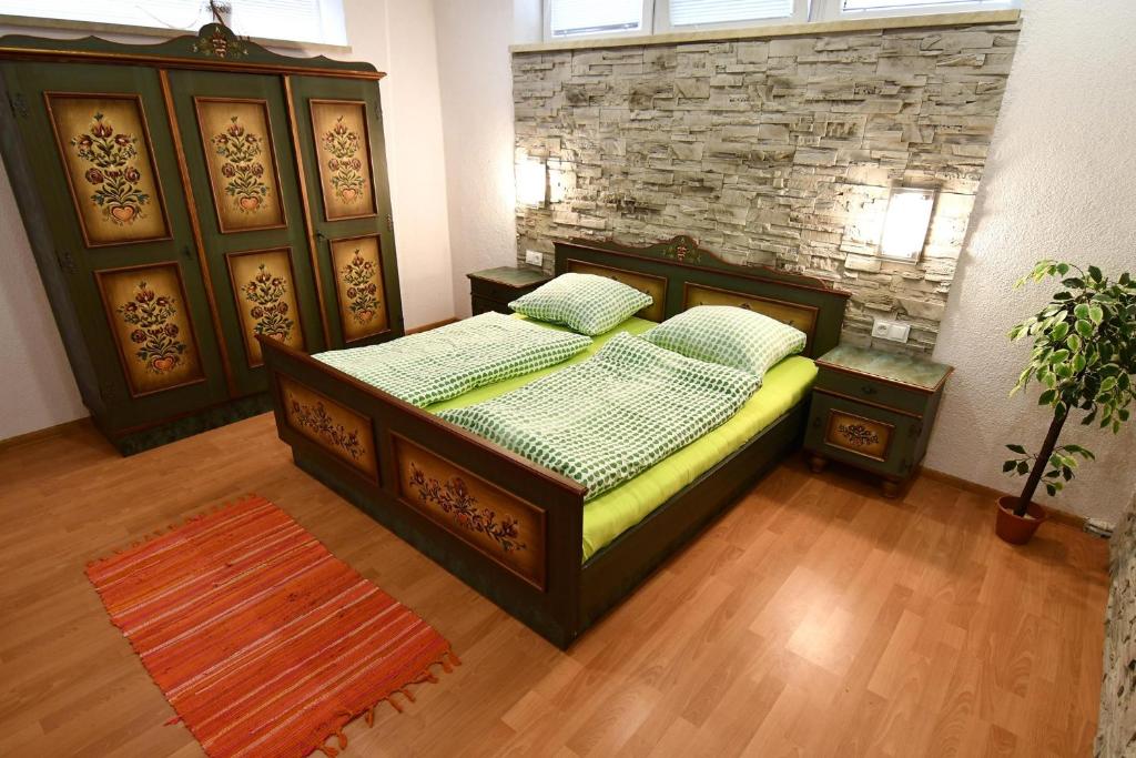 Posteľ alebo postele v izbe v ubytovaní APARTMENTS V+K