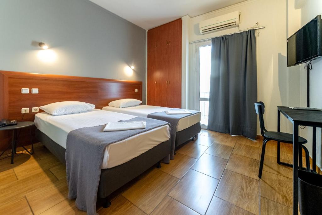 Letto o letti in una camera di Stalis Hotel