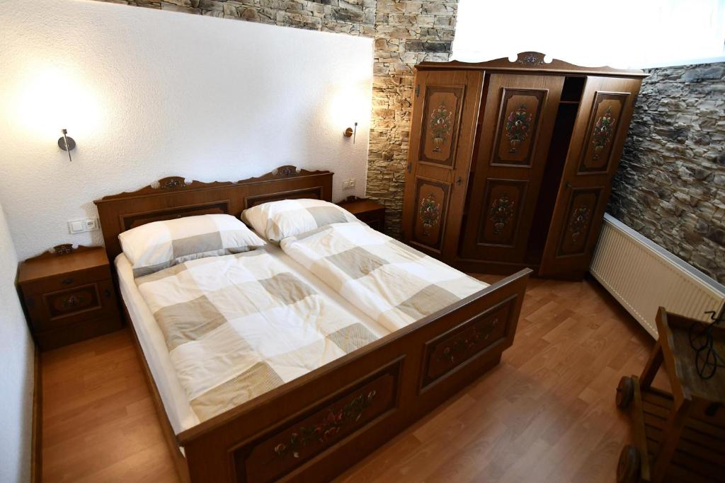 Posteľ alebo postele v izbe v ubytovaní APARTMENTS V+K