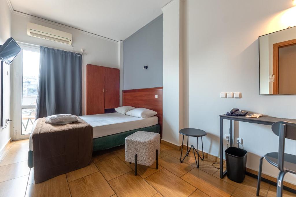 Letto o letti in una camera di Stalis Hotel
