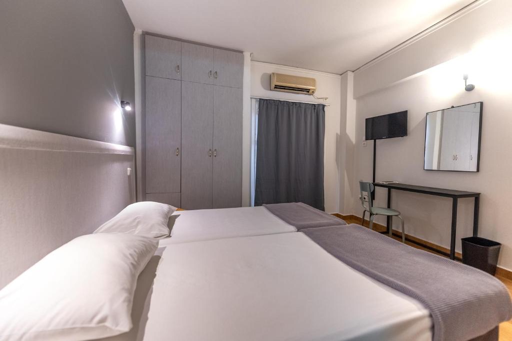 Letto o letti in una camera di Stalis Hotel