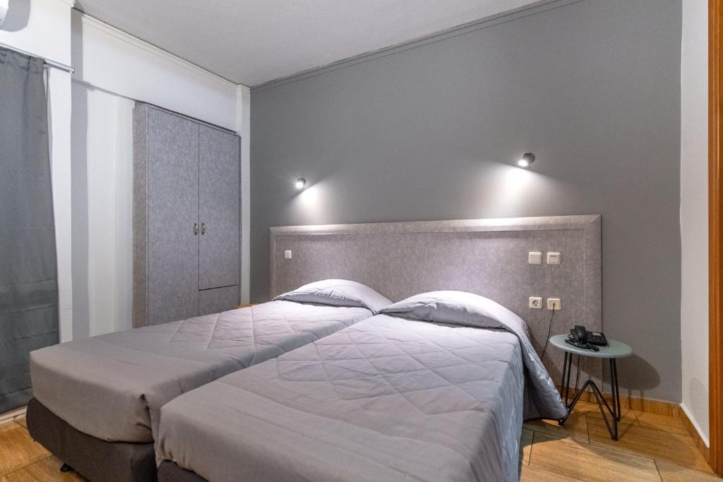 Letto o letti in una camera di Stalis Hotel