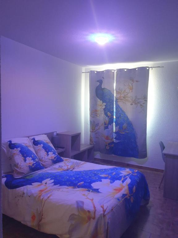 Postel nebo postele na pokoji v ubytování Horus Hôtel