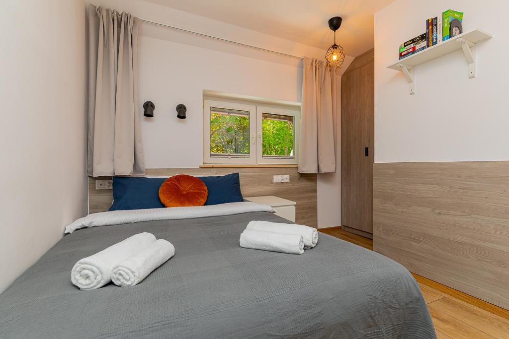 Postel nebo postele na pokoji v ubytování Hostel Szczelinka