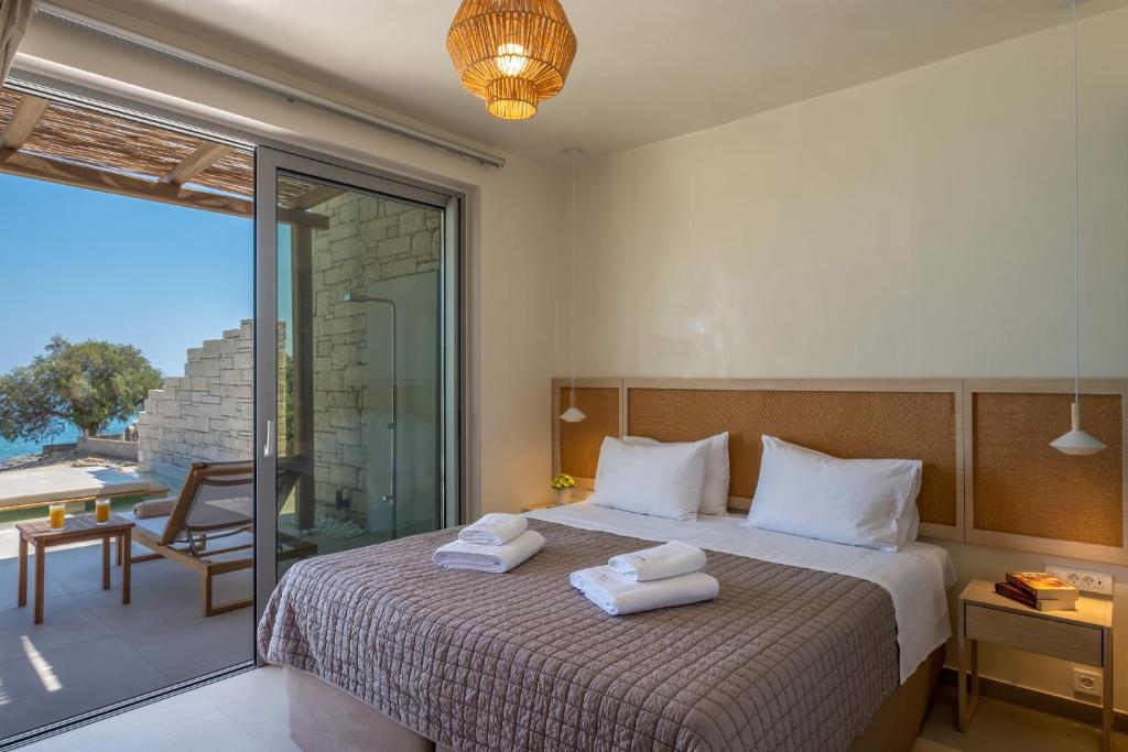 Postel nebo postele na pokoji v ubytování Salvia Luxury Collection Suites