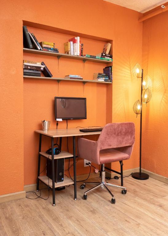 TV a/nebo společenská místnost v ubytování Bungalows Hostel