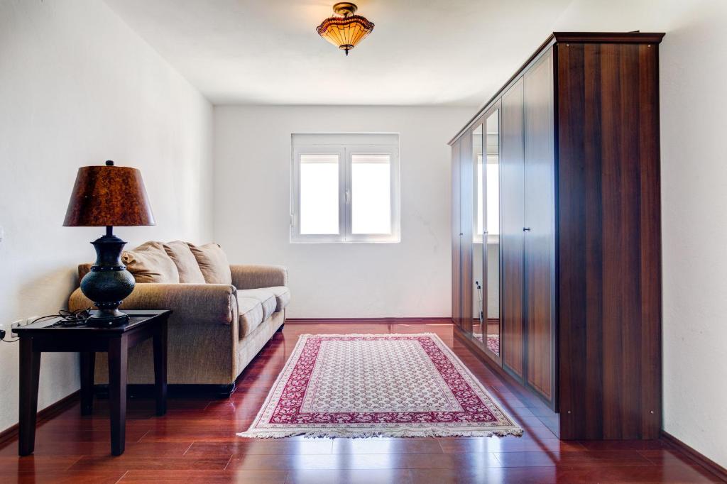 Postel nebo postele na pokoji v ubytování Vera Apartments