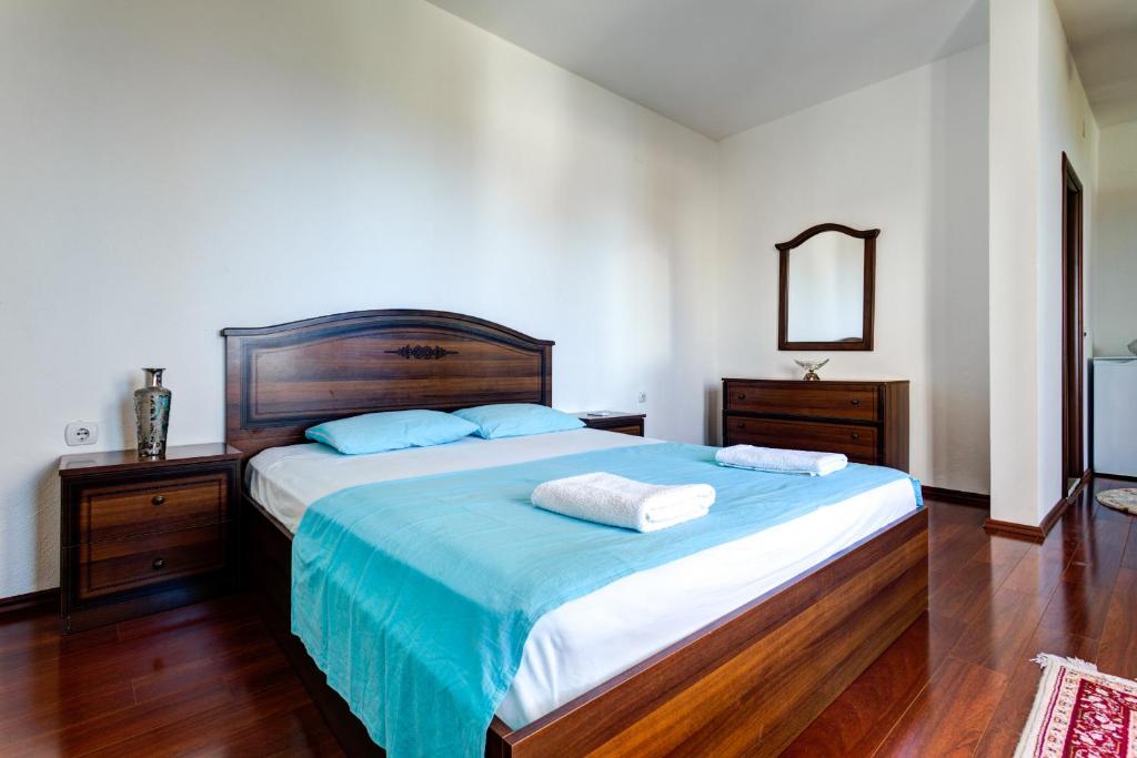 Postel nebo postele na pokoji v ubytování Vera Apartments