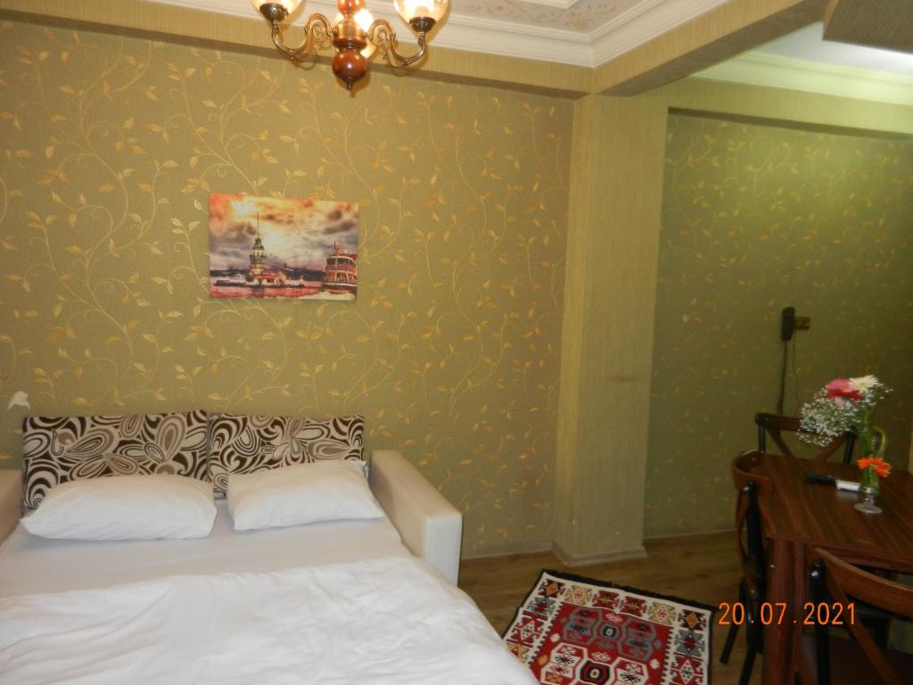 Postel nebo postele na pokoji v ubytování Royal Suites Sultanahmet