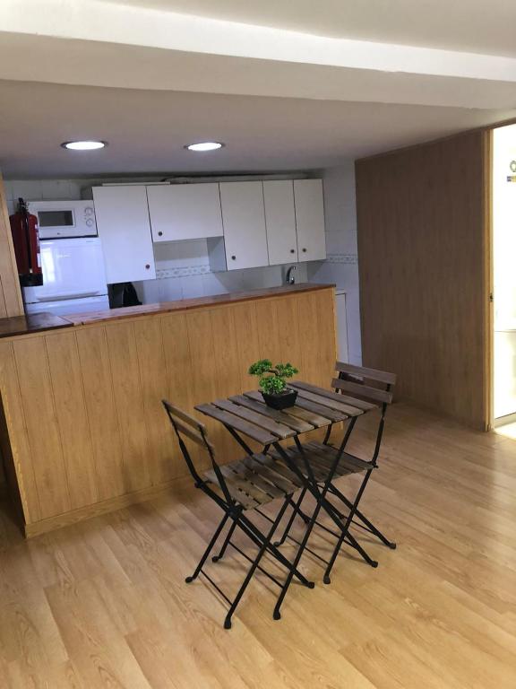 Kuchyňa alebo kuchynka v ubytovaní APARTAMENTOS HÉRCULES SEVILLa