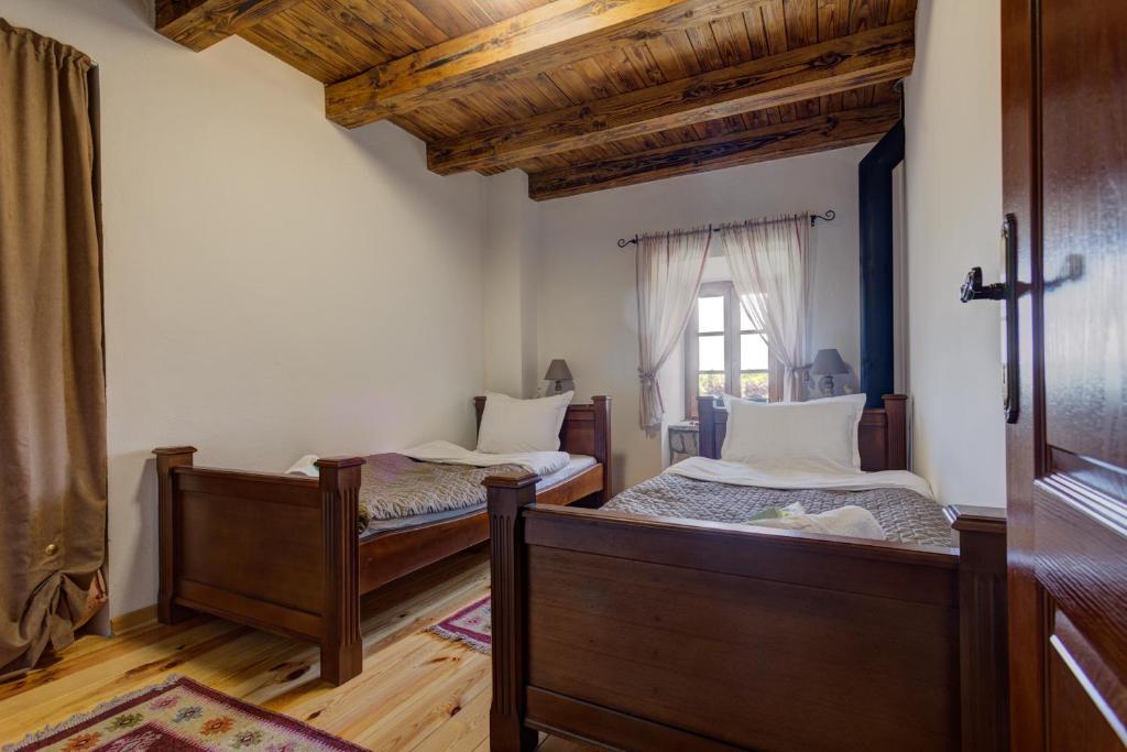 Postel nebo postele na pokoji v ubytování Etno Villa Mokanji