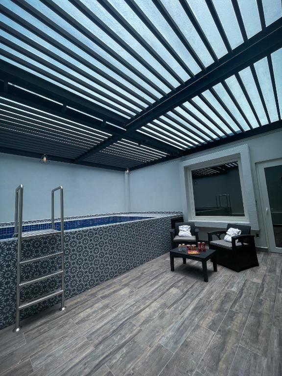 Postel nebo postele na pokoji v ubytování Fato Hotel
