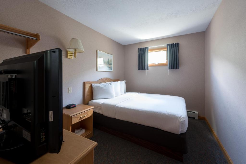 Adirondack Retreat Inn & Suites - Suíte Com Cozinha De 2 Quartos