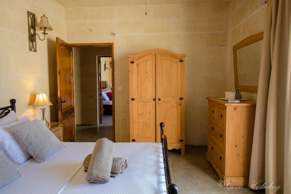 Postel nebo postele na pokoji v ubytování Villa Mandolina