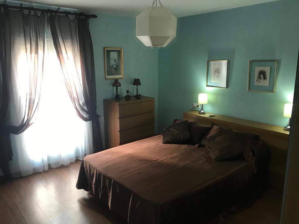 Posteľ alebo postele v izbe v ubytovaní Apartamento Entre el Falla y la Caleta