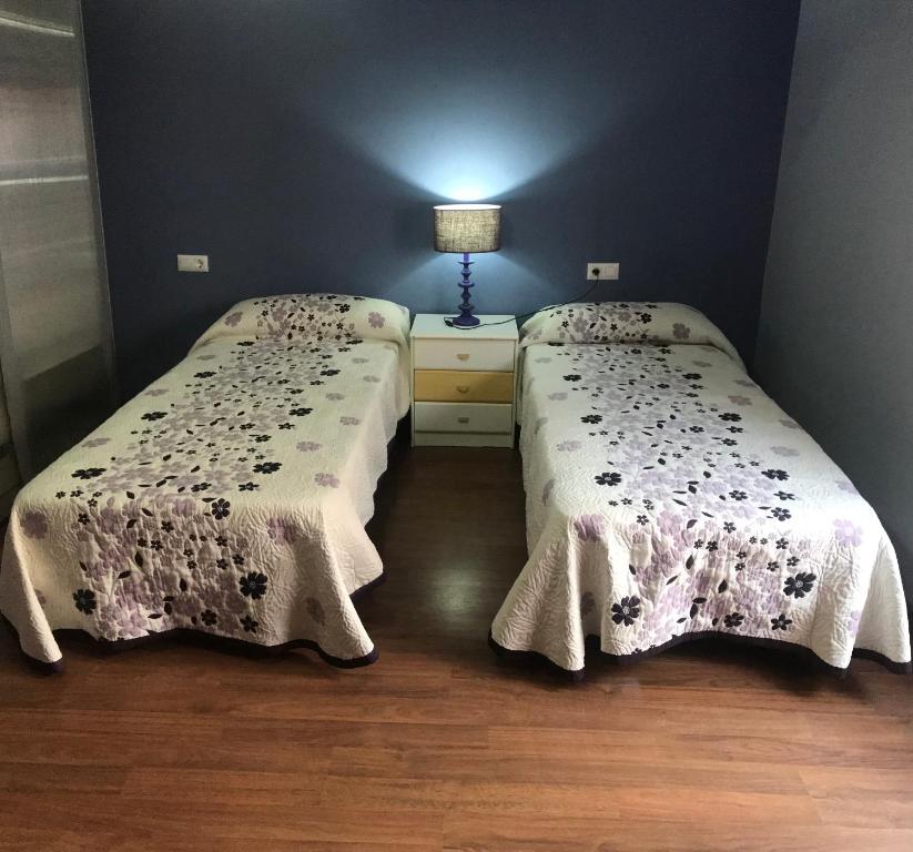 Posteľ alebo postele v izbe v ubytovaní Apartamento Entre el Falla y la Caleta