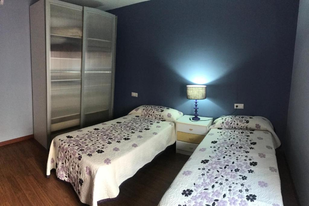 Posteľ alebo postele v izbe v ubytovaní Apartamento Entre el Falla y la Caleta