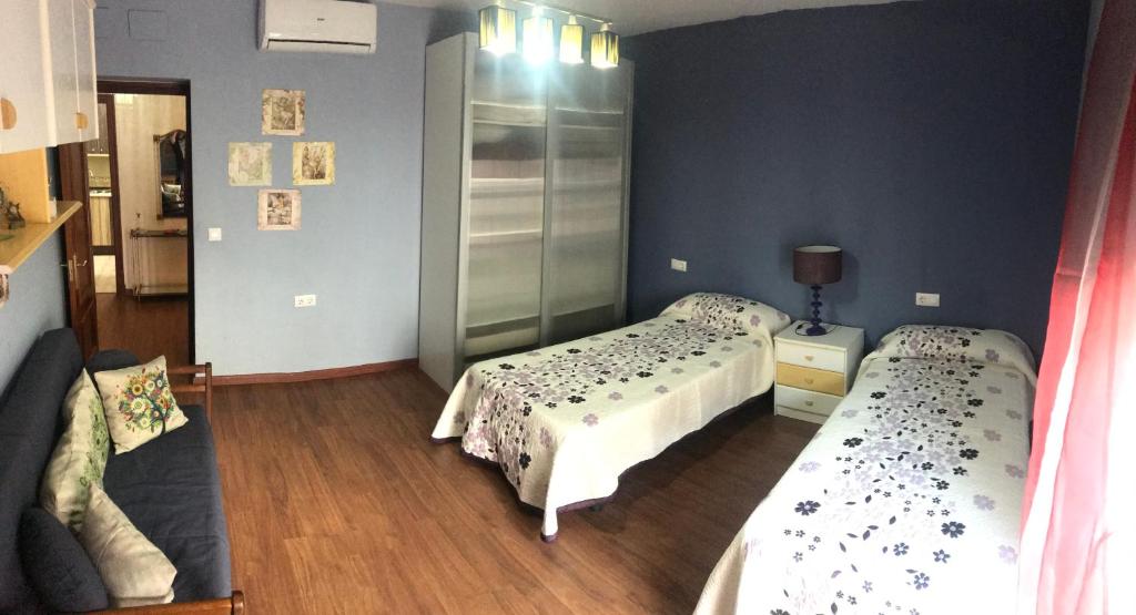 Posteľ alebo postele v izbe v ubytovaní Apartamento Entre el Falla y la Caleta