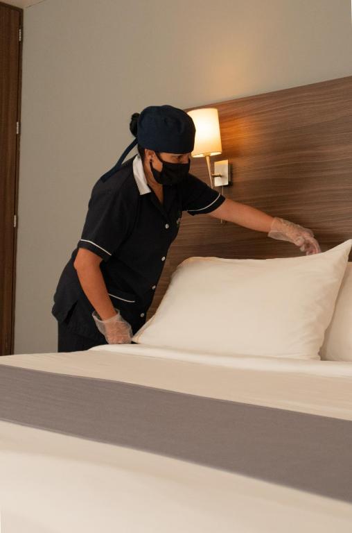Postel nebo postele na pokoji v ubytování El Hotel Business Class - Zamora Centro