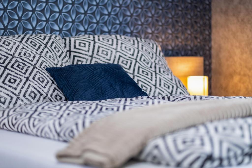 Łóżko lub łóżka w pokoju w obiekcie MyFlat Premium Resort