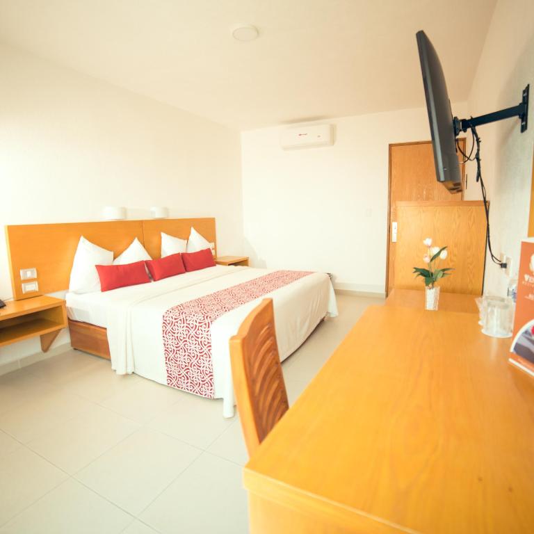 Postel nebo postele na pokoji v ubytování Hotel Klimt
