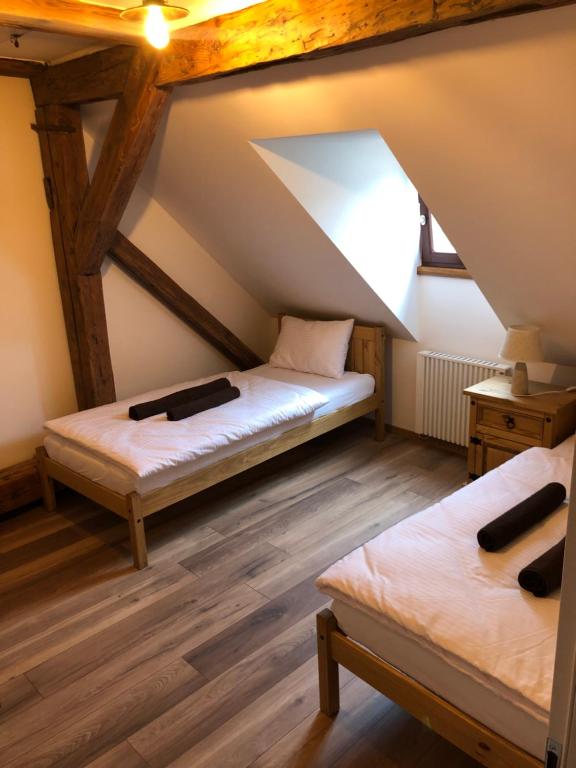 Postel nebo postele na pokoji v ubytování Egrensis Apartments