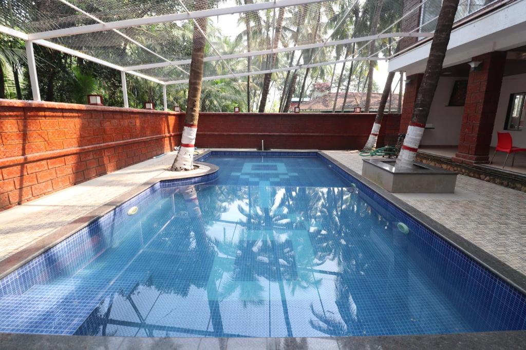 Swimming pool sa o malapit sa Pool Stay At Alibaug