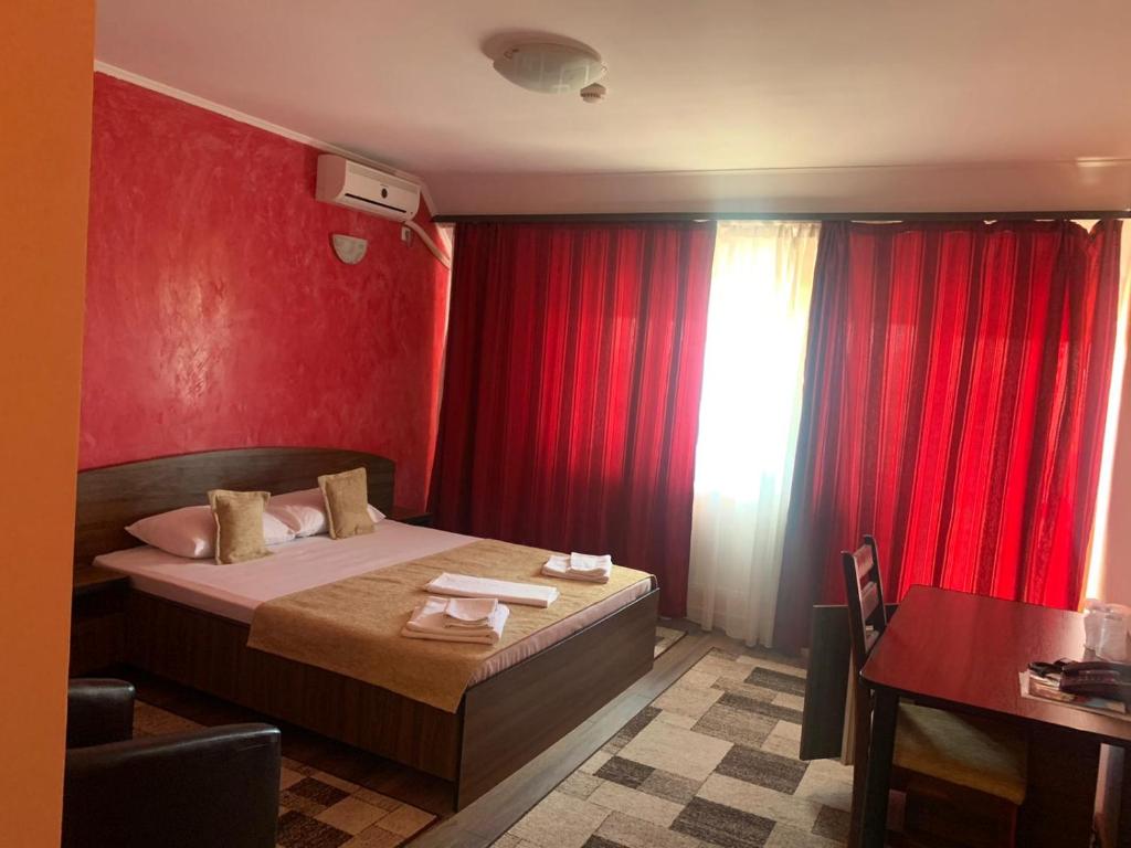 Postel nebo postele na pokoji v ubytování Hotel Eden