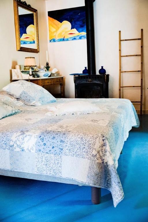 Postel nebo postele na pokoji v ubytování Gite Fa Mille maison bleu