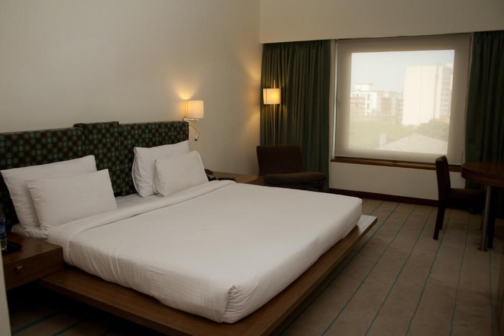 Postel nebo postele na pokoji v ubytování Hotel Parc Estique